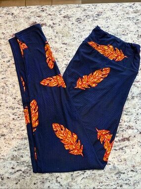 LuLaRoe Navy Leggings with Orange Feather Print
